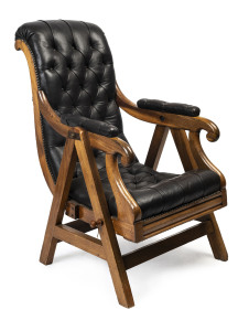 A Colonial Australian rocking chair, Tasmanian blackwood frame with black button-back leather upholstery, 19th century, 54cm across the arms