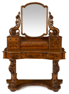 A Victorian dressing table with cylinder rolled top and carved base, Tasmanian huon pine, circa 1875