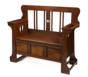 Australian Arts and Crafts hall seat by Rojo of Melbourne, blackwood, early 20th century, 98cm high, 112cm wide, 42cm deep