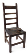 ERIK PEDERSEN Ladderback chair stamped Montsalvat, Victoria, circa 1974, accompanied by ERIK PETERSEN wooden mallet, the chair 117cm high