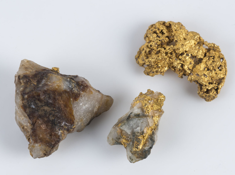 A gold nugget, Central Victoria, 10 grams; together with two gold specimens in matrix, 19 grams,