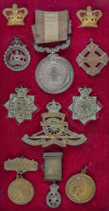 LT. COL. W.M. REEVE, 2nd Battalion, Victorian Rifles, A collection of military medals, uniform and hat badges, epaulettes, buttons and accoutrements, attractively displayed in four mounted presentations. Noted in particular VICTORIA VOLUNTEER Long & Efficient Service Medal (1881-1901) named to LT. COL. W.M. REEVE, (one of only 104 issued to officers), COLONIAL AUXILIARY FORCES DECORATION (one 67 issued during 1901), WW1 service medals named to STG. N.G. ONIANS (1263), 38th Battalion A.I.F. Plus