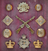 LT. COL. W.M. REEVE, 2nd Battalion, Victorian Rifles, A collection of military medals, uniform and hat badges, epaulettes, buttons and accoutrements, attractively displayed in four mounted presentations. Noted in particular VICTORIA VOLUNTEER Long & Effic - 4