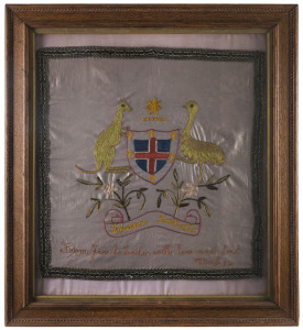 A needlework display, circa 1915, Egypt, depicting a naive version of an Australian coat-of-arms with "Advance Australia" in the scroll below and the words "From Jim to Eadie with love and best Wishes" below imagery. The whole piece now framed and glazed; overall 76 x 68cm.