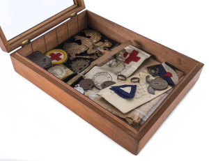 FREDERICK CLIFFORD LAVIS [1892 - 1953] Ambulance Driver with the A.I.F. in France 1916 - 1919 An Australian cedar display box containing items that Lavis collected, souvenired or made. His "trench art" pieces are of a particularly high standard and includ