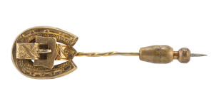 An Australian gold stick pin