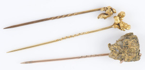 Three gold nugget stickpins, one with matrix inclusions,19th century, 7cm high, 11 grams total