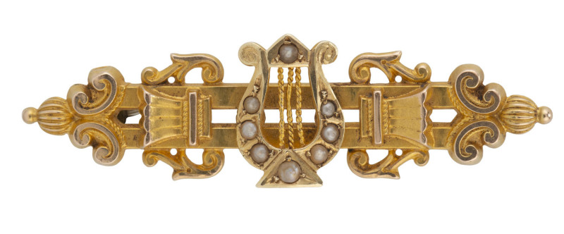 A 15ct gold & seed pearl "Lyre" brooch by Willis & Sons, Melbourne, c1895-1900.Length: 6cm. Weight: 5.5gms.