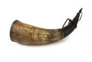 A scrimshaw powder horn with lion and coat of arms, 19th century, ​30cm long