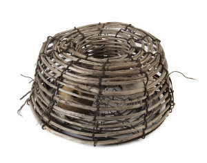 A vintage fisherman's lobster pot, woven tea tree and iron, 20th century, 45cm high, 80cm diameter