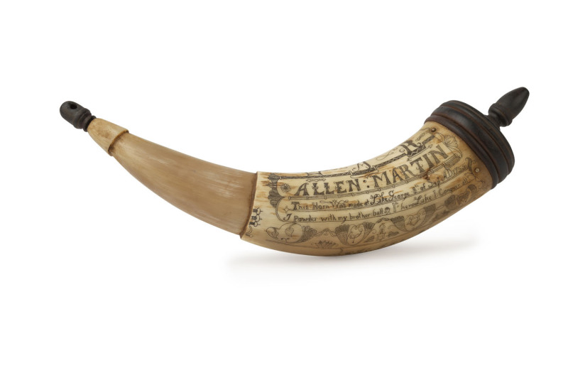 A scrimshaw powder horn engraved "Allen Martin", ​33cm long