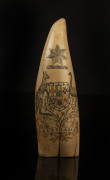 A scrimshaw whale's tooth with engraved Australian coat of arms titled "Australia", ​14cm high