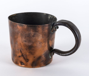 A Colonial one pint copper measure with Queen Victoria stamp and broad arrow mark, mid 19th century, 90cm high, 15cm across