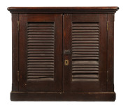 A ship's cabinet solidly made in teak, late 19th early 20th century, 90cm high, 103cm wide, 61cm deep