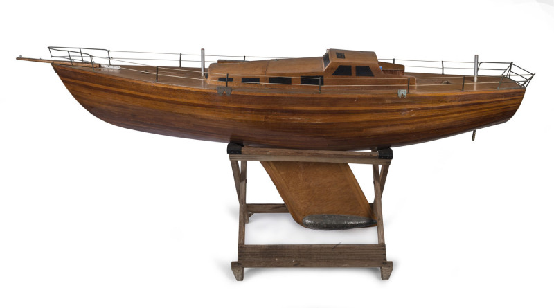 An impressive hand built model boat on stand, mid 20th century, ​185cm long