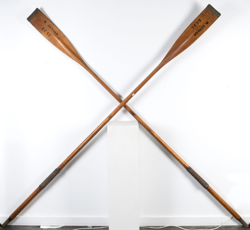 A pair of antique sculling oars marked "M. Denham, E.C.S.C.", ​280cm long