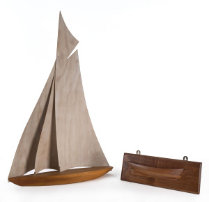 A model timber boat and wall mounted boat hull, the taller 76cm high