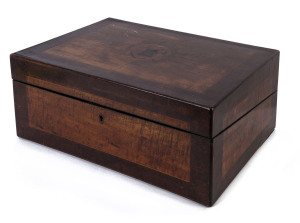 A Colonial writing box compendium, cedar and fiddleback blackwood with a central huon pine monogram surrounded by quartered panels, fitted interior with ebony trim on cedar with leathered writing slope, Tasmanian origin, mid 19th century, 16cm high, 36cm 