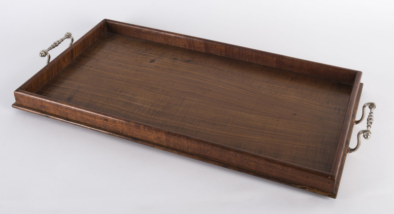 An Australian serving tray, Tasmanian fiddleback blackwood, early 20th century, ​62cm across the handles