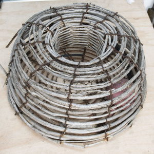 A vintage fisherman's lobster pot, woven tea tree and iron, 20th century, 45cm high, 80cm diameter