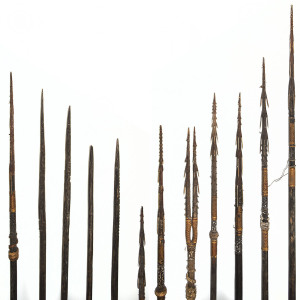 Twelve spears, carved wood and woven fibre with quill barbs, Trobriand Islands, Solomon Islands and Papua New Guinea, 19th and early 20th century, the largest 355cm high
