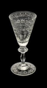 A fine English Georgian glass engraved with English rose motif, 18th century, ​12.5cm tall