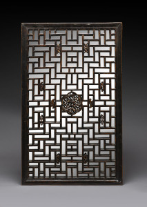 A Chinese window screen with later mirror backing, 19th/20th century, 106 x 65cm