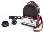 LEITZ: Leica Summaron 35mm f2.8 lens [#2100930] in Leitz goggles with fitted leather case; in original Leitz [11106Q] box with Leica 12585 metal lens hood. As new.