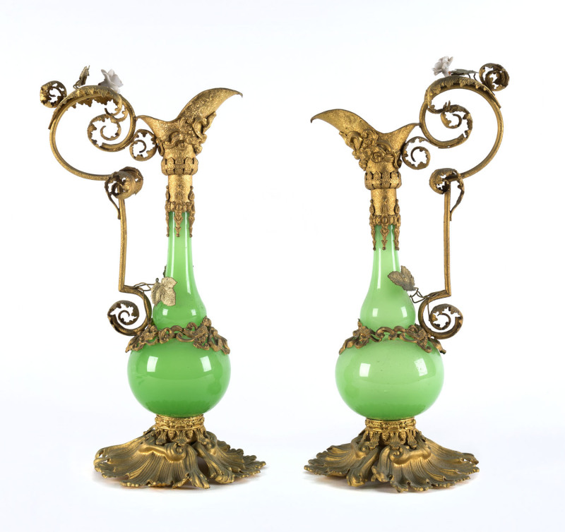 A pair of Italian Rococo style ewers, gilt metal, glass and porcelain, 20th century, ​28cm high