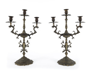 A pair of three branch candelabra with dragon motif, Italian, early to mid 20th century, ​41cm high