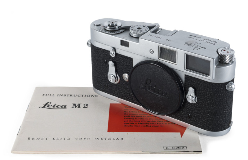 LEITZ: Leica M2 camera body [#1006181], 1960; chrome, with self-timer. [Owner's security number neatly etched on top plate.] with original instruction manual.