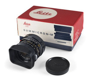 LEITZ: Leica Summicron-M 35mm f2 lens with black finish [11310; #2974529] in Leica box with lenshood 12524, caps, instruction manual and guarantee card. As new.