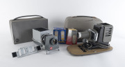 LEITZ: Slide projectors: Prado 150 [#290374] with instruction manual in fitted case circa 1955; also, Pradix projector in fitted case; with instructions; circa 1967. 