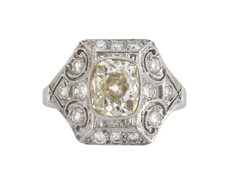 An 18ct white gold and diamond Art Deco style ring, with 2.36ct central diamond surrounded by pave set old European cut and brilliant cut diamonds, stamped "18ct", 6.7 grams total,