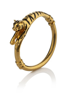 An 18ct yellow gold tiger bangel with spring hinge and enamel decoration, pictorial maker's mark, 39.2 grams,