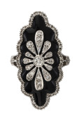 A 14ct white gold Art Deco style ring with elongated marquise shaped top mount featuring black onyx background