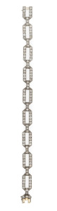 French millegrain edged platinum Art Deco bracelet comprising nine open centered links surrounded by brilliant and double cut diamonds of a total estimated weight of 4.5ct (clarity VS-SI), 18.2 grams