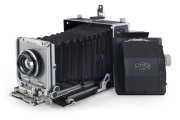 MICRO PRECISION PRODUCTS LTD.: M.P.P. Mk.VII 5 x 4" Press camera [Serial #9882] with replaceable rollfilm back and Schneider - Kreuznach Symmar 150mm f5.6 lens [#6345435]. (2 items). - 2