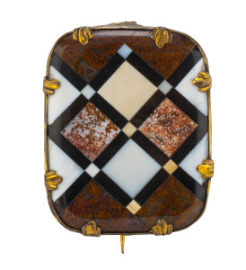 An inlaid stone brooch in pinchbeck mount, 19th century