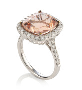 A MORGANITE AND DIAMOND COCKTAIL RING 18ct White gold set white 5.73ct checkerboard faceted morganite surrounded by 0.60 carats of brilliant cut diamonds, weight 5.2 grams total