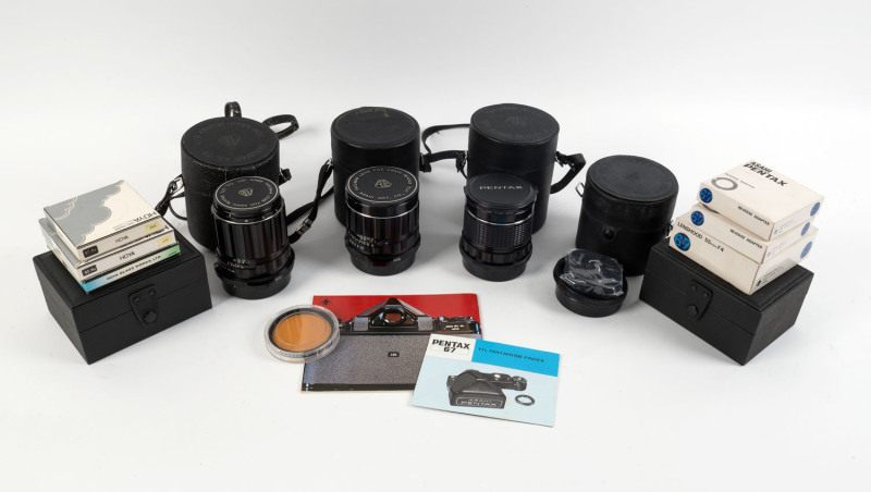 ASAHI KOGAKU: Lenses for the Asahi Pentax 6x7: SMC Takumar 6x7 75mm f4.5 [5832622]; SMC Pentax 6x7 55mm f4 [#8445628]; and SMC Macro-Takumar 6x7 135mm f4 lens [#5467861] all with caps in carry cases. Accompanied by a range of filters and other accessories