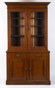 An Australian walnut bookcase circa 1900, 217cm high, 127cm wide, 52cm deep