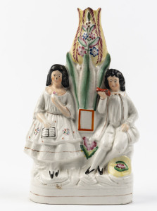 A rare Staffordshire pottery figured vase with tulip top, circa 1840, 26cm high
