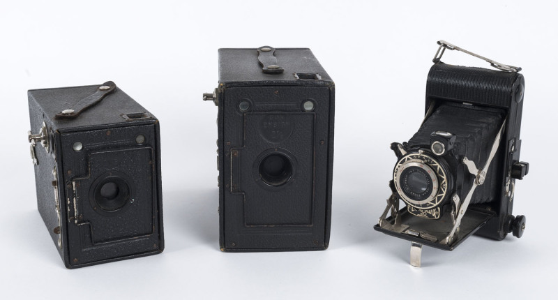 HOUGHTON: An Ensign-Selfix 20 self-erecting folding camera; a Box Ensign 2¼B and a Box Ensign 2½. (3 items).