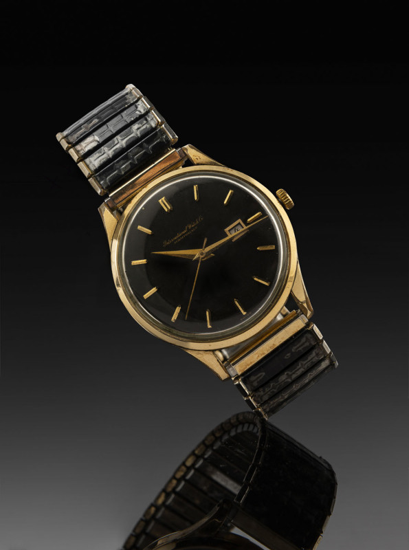 I.W.C. International Watch Company Schaffhausen PATIN gent's wristwatch in yellow gold case with black dial and original band, rare