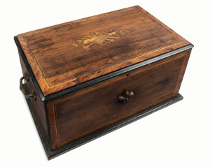 A Swiss clockwork music box with 6 bells, drum and castarnet, housed in an inlaid walnut case, 19th century, 64cm across