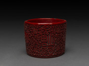 A Chinese cinnabar lacquer bracelet, 19th century, ​6cm wide