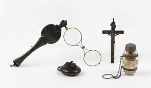 A crucifix, lorgnette, smelling salts scent bottle and bog oak Victorian pendant, 19th and 20th century, the lorgnette 15cm high