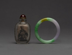 A Chinese opium bottle with portrait of Chiang Kai-Shek; together with a jade bangle, 20th century, ​the bottle 9.5cm high