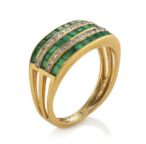 A ladies cocktail ring, yellow gold set with rows of diamonds and emeralds, marks illegible, 4 grams